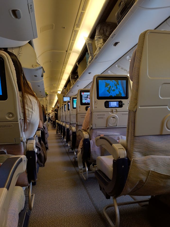 Seats and Corridor in Airplane